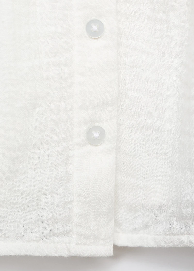 Embroidered babydoll-collar blouse