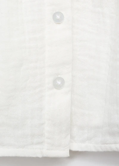 Embroidered babydoll-collar blouse