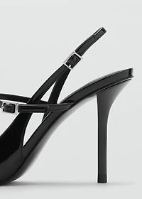 Patent leather shoes with straps and buckle