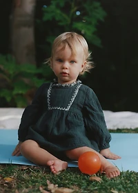 Dress and frog with embroidered details
