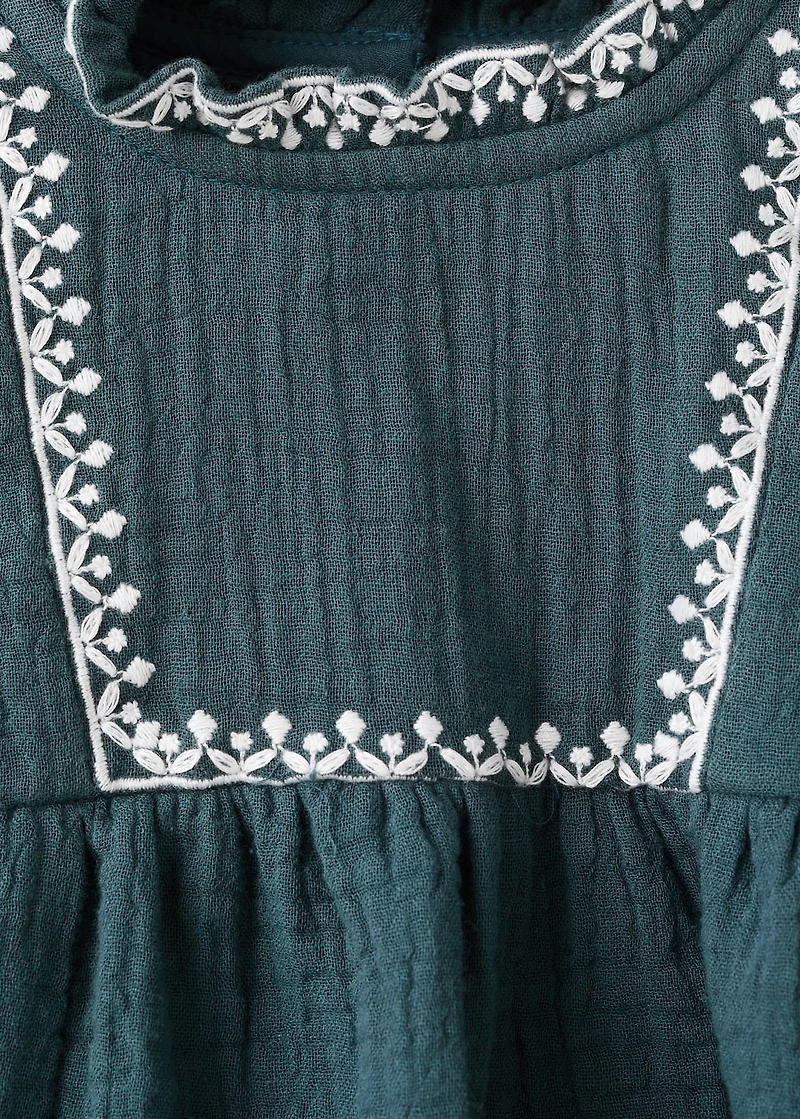 Dress and frog with embroidered details