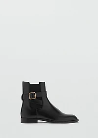 Ankle boots with elastic panel and buckle