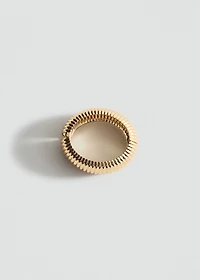 Rigid bracelet with relief