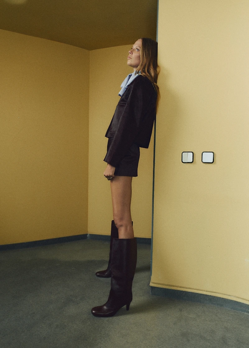 Leather mini-skirt with fur