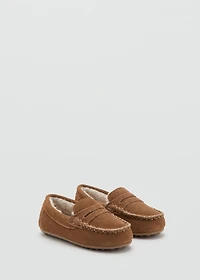 Leather moccasin with shearling lining