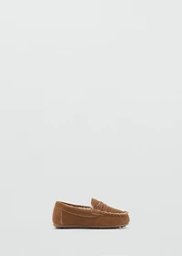 Leather moccasin with shearling lining