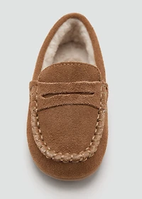 Leather moccasin with shearling lining