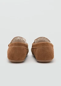 Leather moccasin with shearling lining