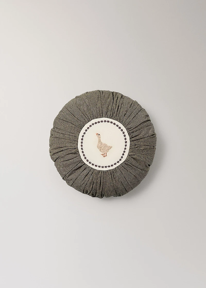 Round children's cotton pillow with embroidered detail