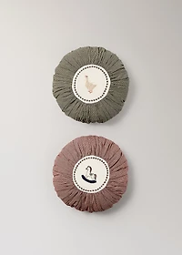 Round children's cotton pillow with embroidered detail