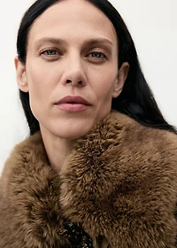 Tweed jacket with fur collar