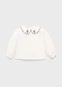 Embroidered babydoll-collar blouse