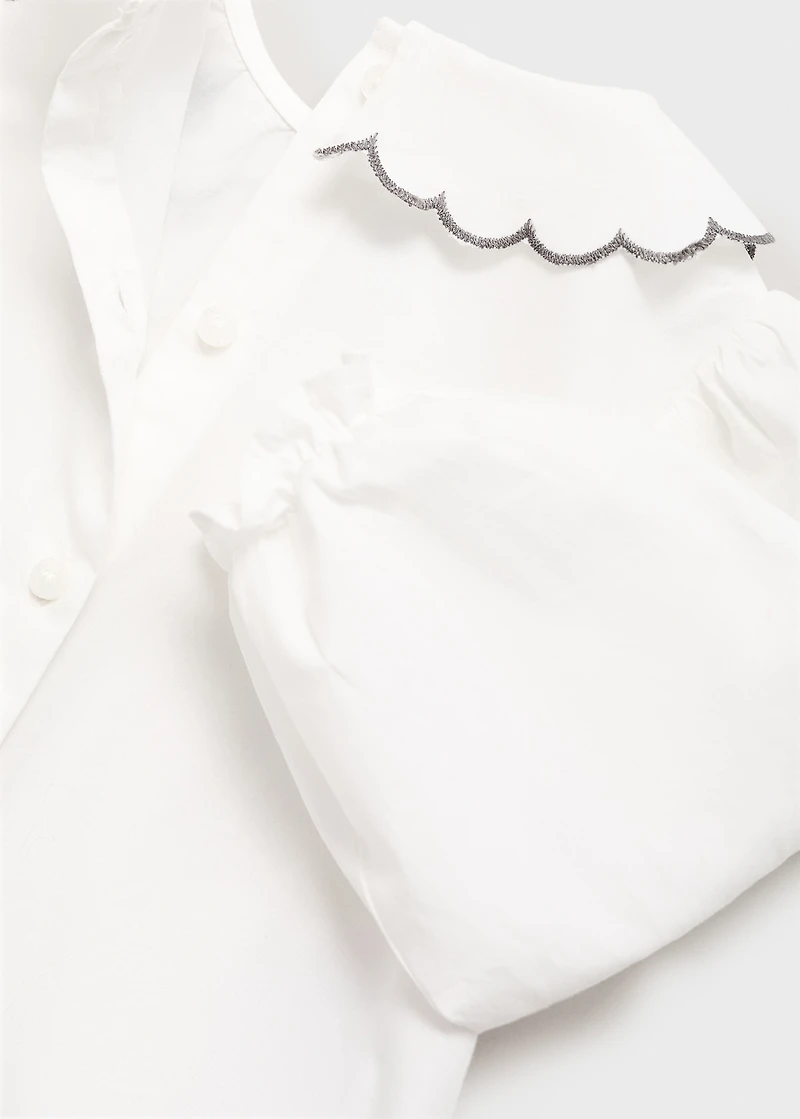 Embroidered babydoll-collar blouse