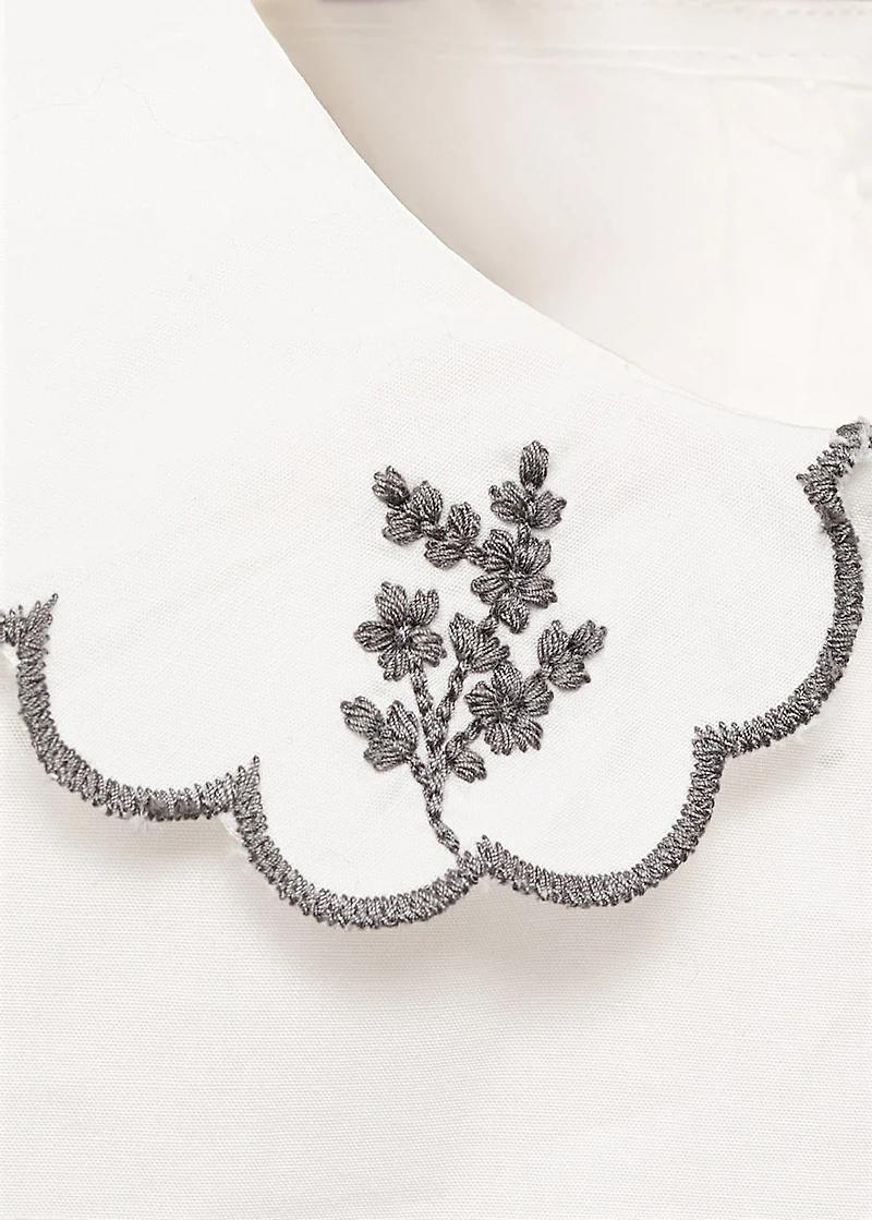 Embroidered babydoll-collar blouse