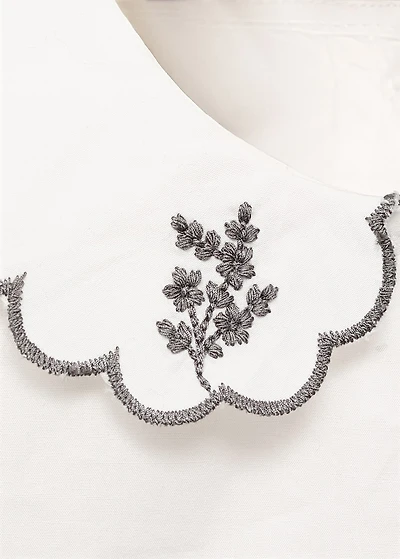 Embroidered babydoll-collar blouse