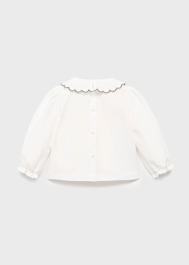 Embroidered babydoll-collar blouse