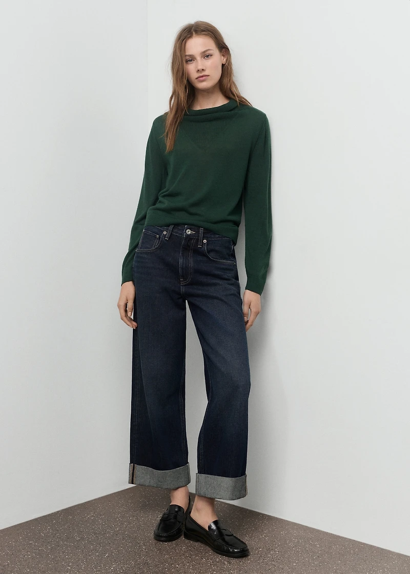 Knitted sweater with draped neck