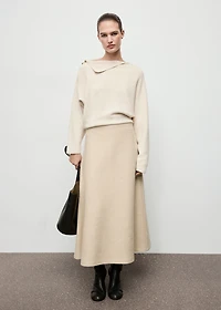 Sweater with asymmetrical neck and jewel buttons