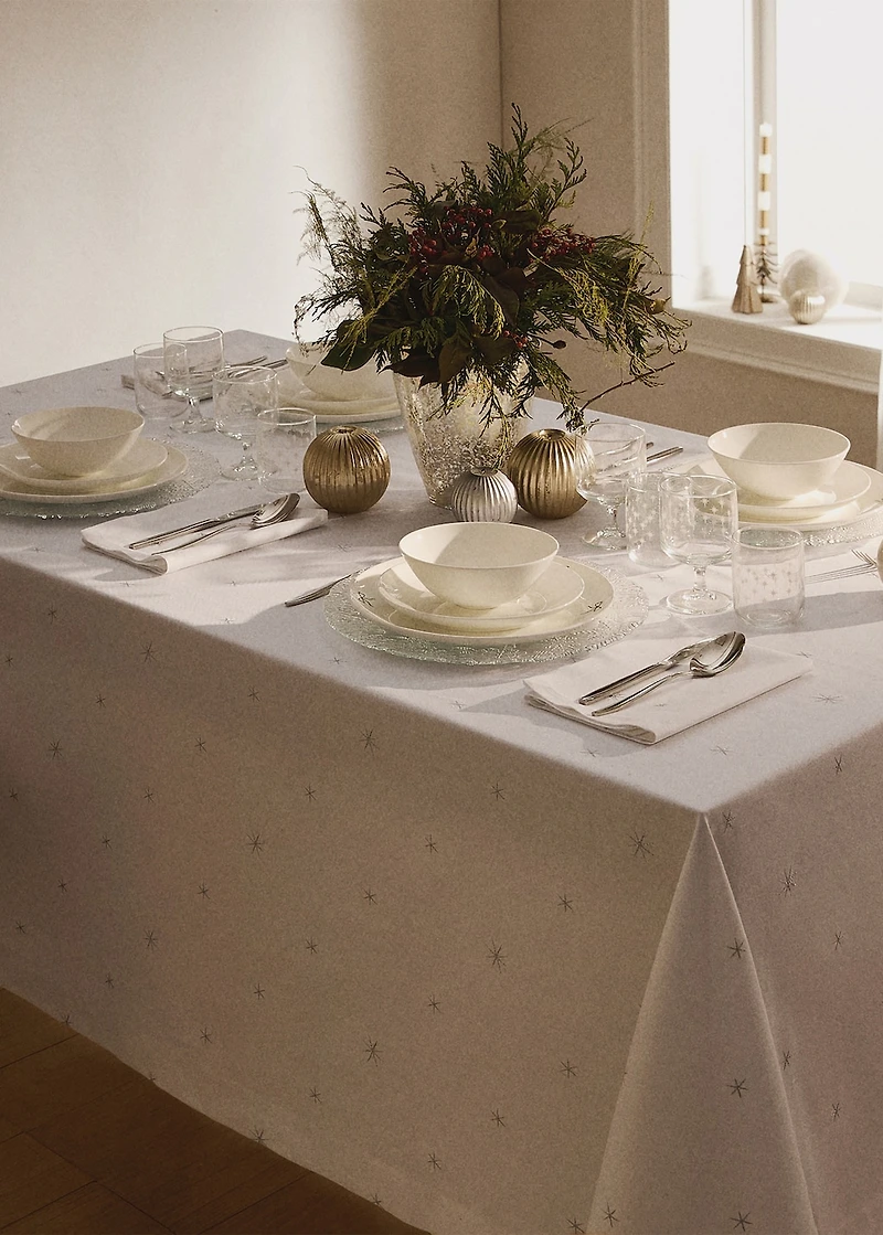 100% cotton tablecloth with embroidered star details for 6 to 8 diners