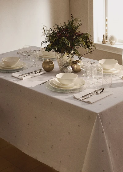 100% cotton tablecloth with embroidered star details for 6 to 8 diners