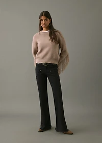 Flared jeans with studs