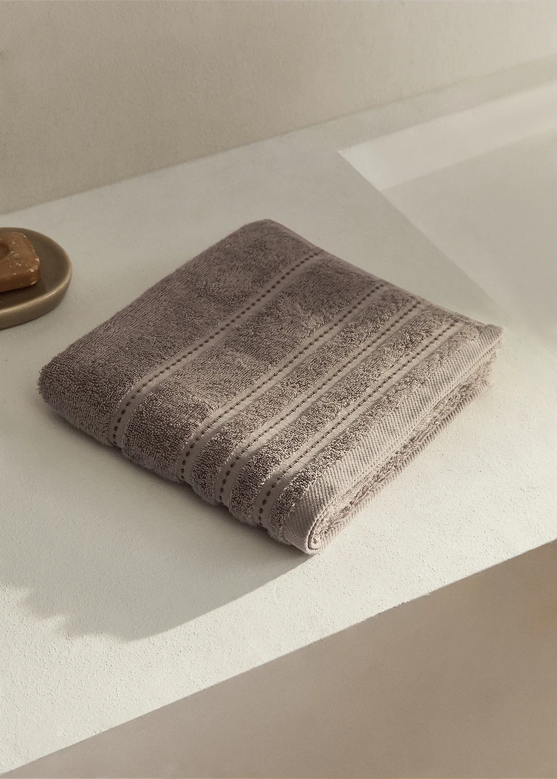 Cotton washbasin towel with embroidered dots