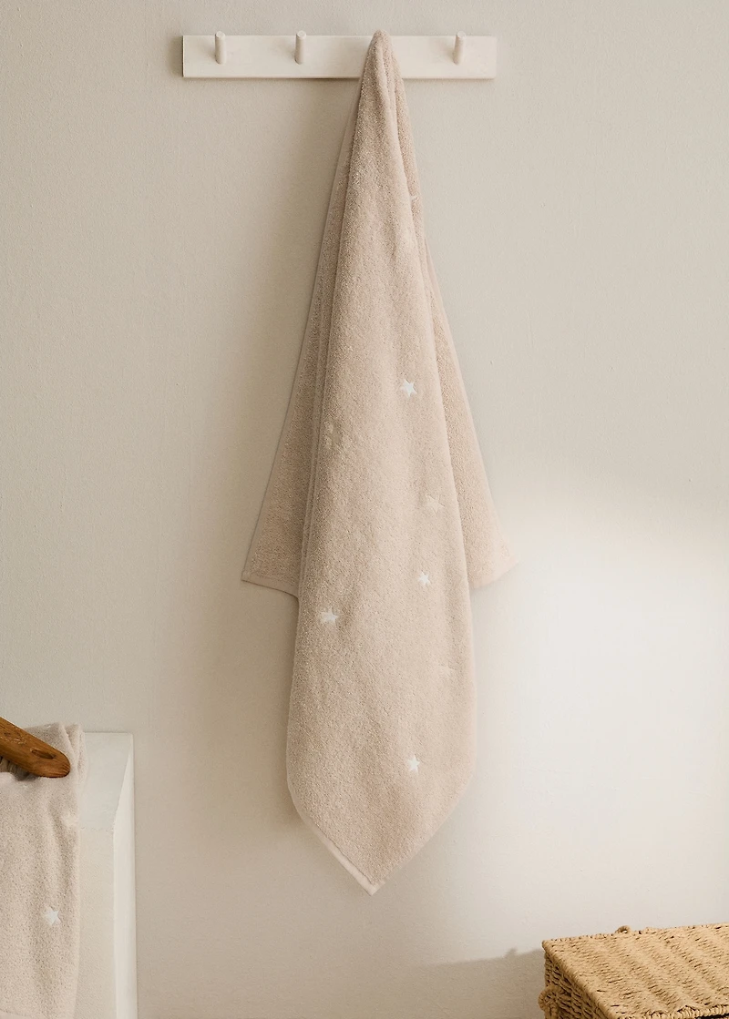 Children's bath towel with glow-in-the-dark stars