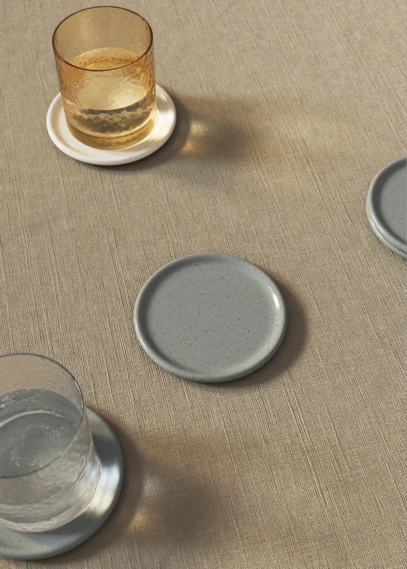 Stoneware coasters with spots