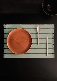 Striped placemats with tassels