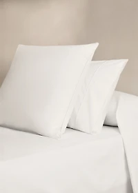 Two 500-thread count cotton percale pillowcases with rounded piping detail 50x75 cm