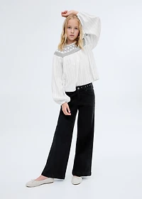 Low-waist studded jeans