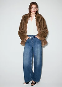 Wide-leg mid-rise jeans with a crossover waistband