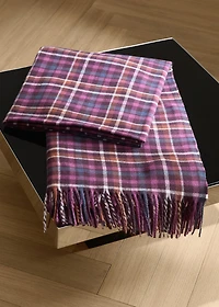 Fringed blanket with check design