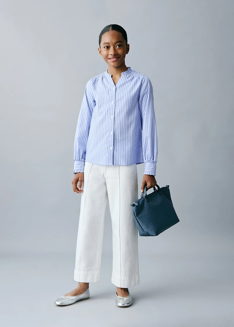 Striped shirt with pleated details