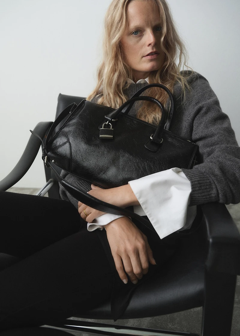 Shiny handbag with handles