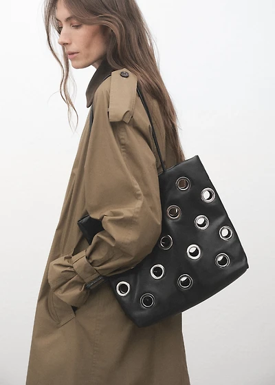 Shoulder bag with eyelets