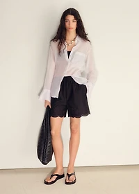 Satin shorts with embroidered hem