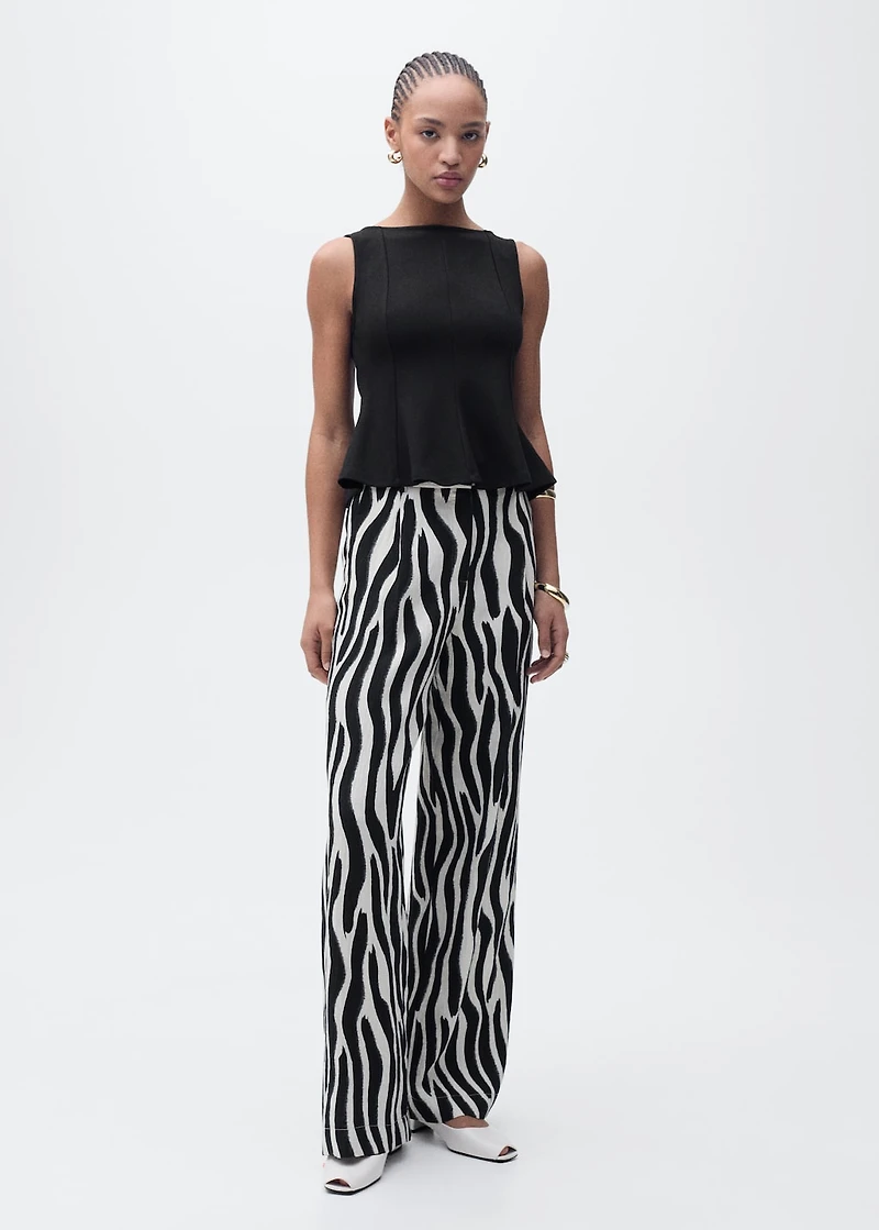 Peplum top with seam detail