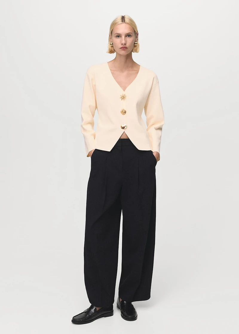 Knitted jacket with jewel buttons