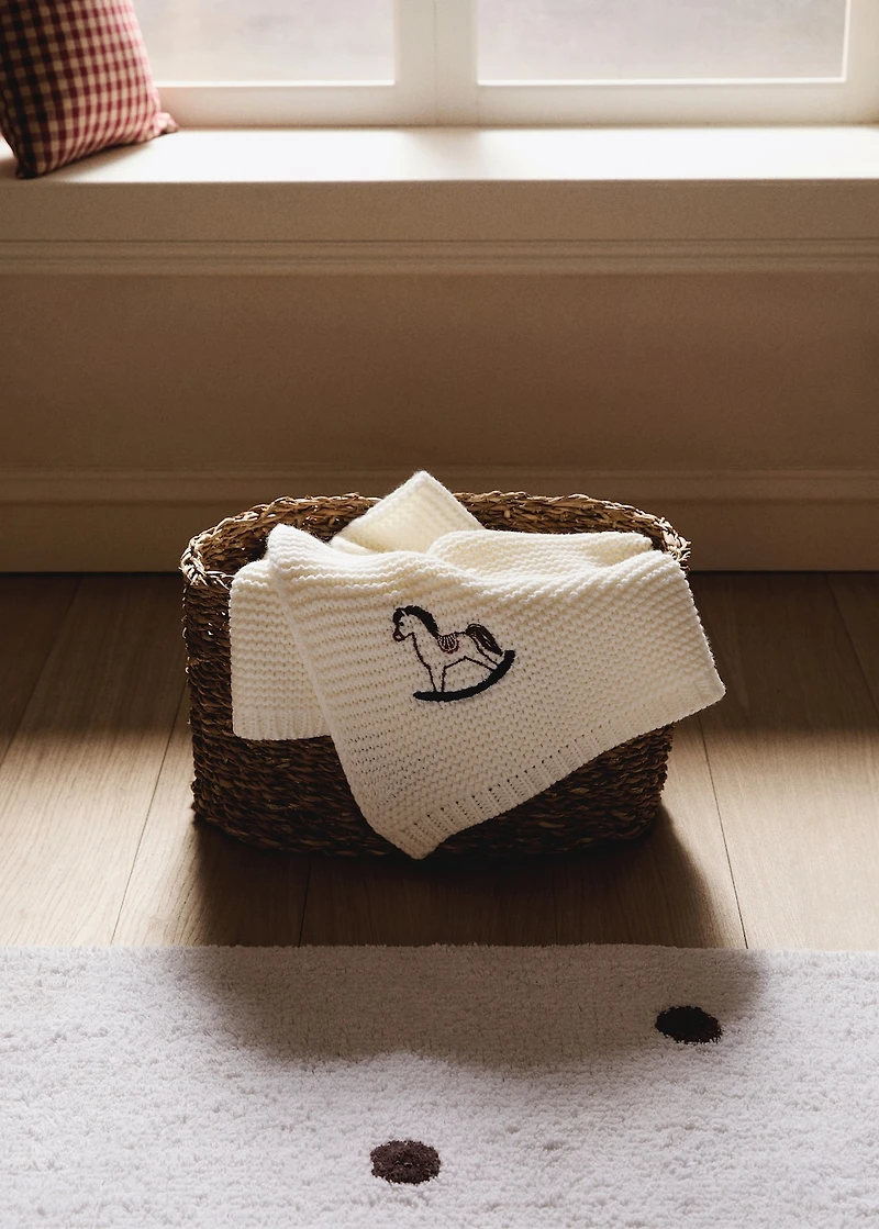 Embroidered knitted children's blanket