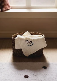 Embroidered knitted children's blanket