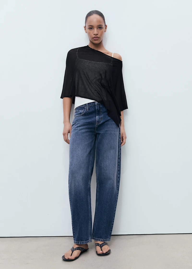 Asymmetrical knitted cape