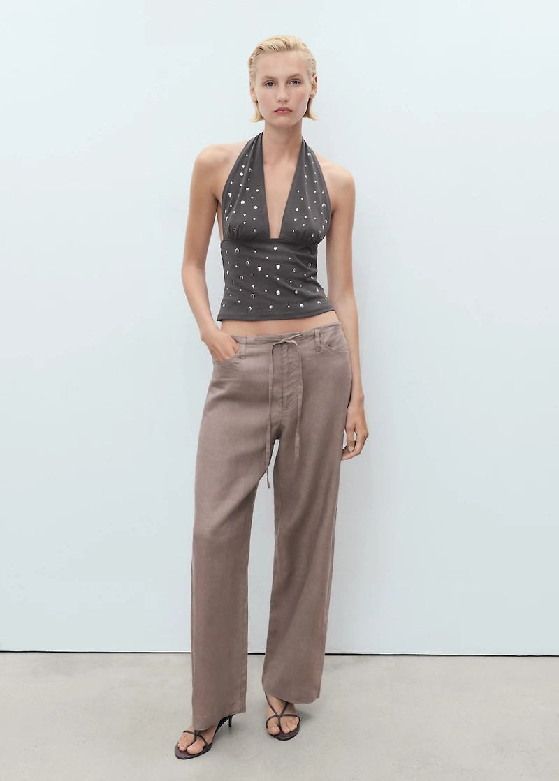 Halter top with metallic appliqués