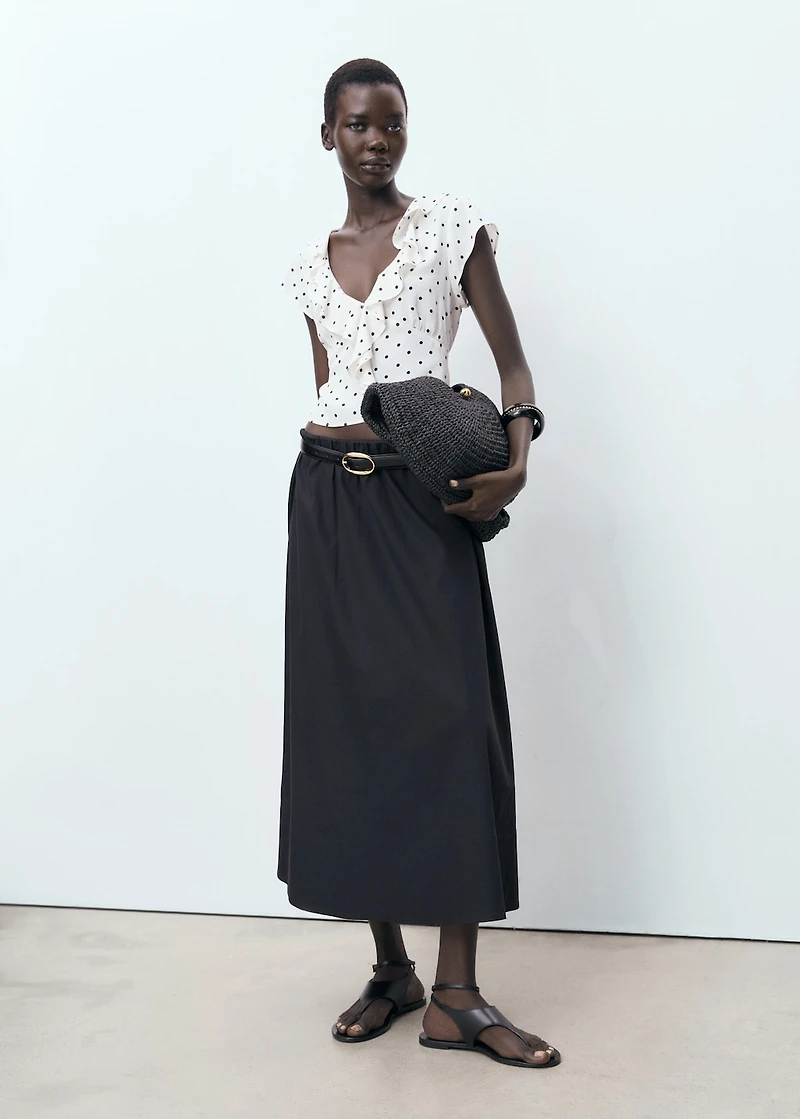 Polka-dot blouse with ruffles