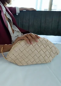 Braided leather clutch bag