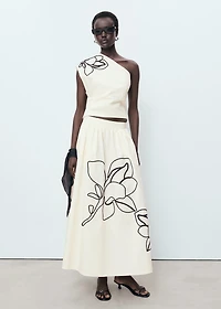 Asymmetrical flower-embroidered top