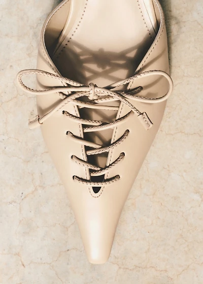 Lace-up high heel shoes