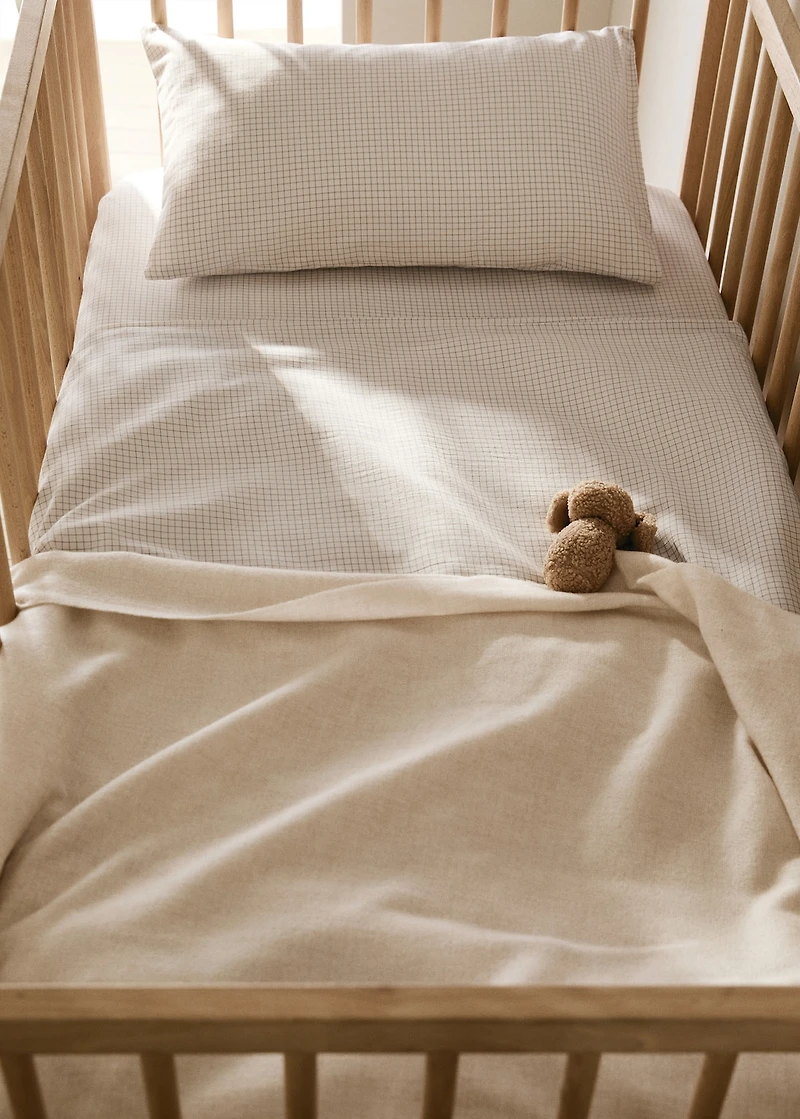 Cotton yarn-dyed fitted sheet with mini-check pattern for cot