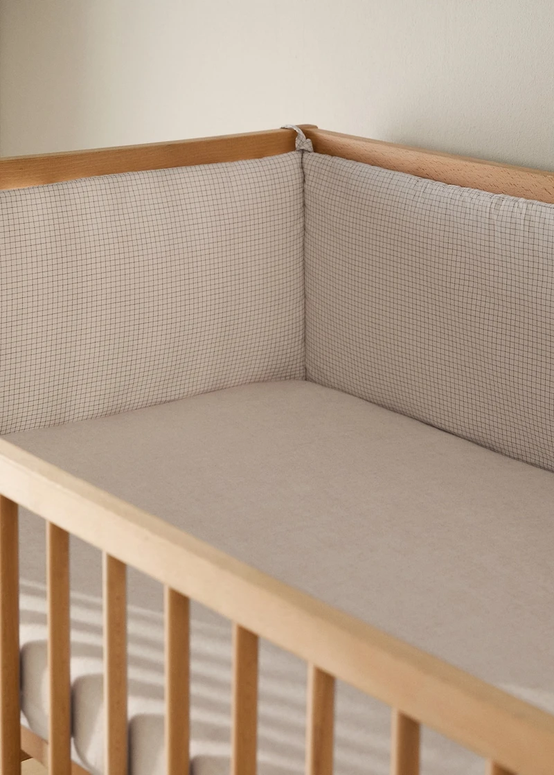 Cotton yarn-dyed protector with mini-check pattern for cot
