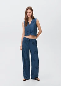 Embroidered linen vest